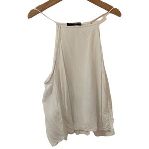 Brandy Melville white tank top. Super cute piece. It’s one size.